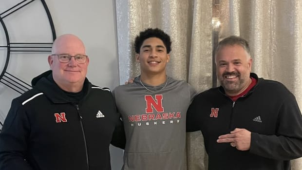 Donovan Jones with Nebraska football special teams coordinator Ed Foley and head coach Matt Rhule